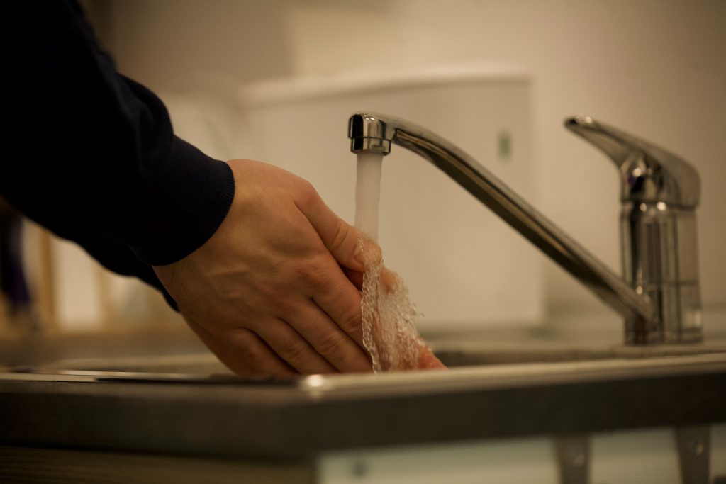 a photo of washing hands